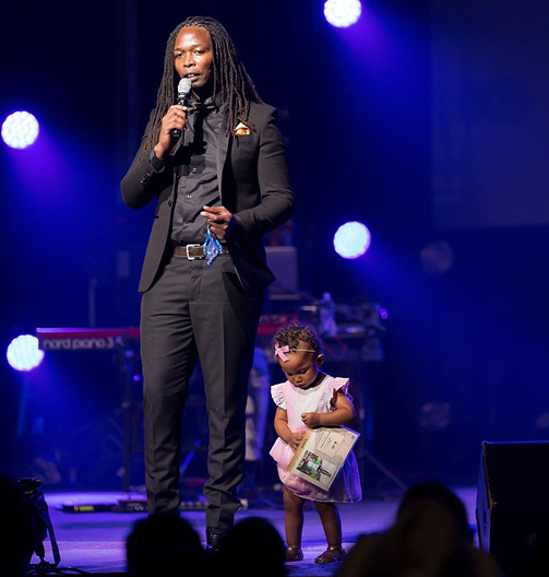 Jey Mbiro with daughter